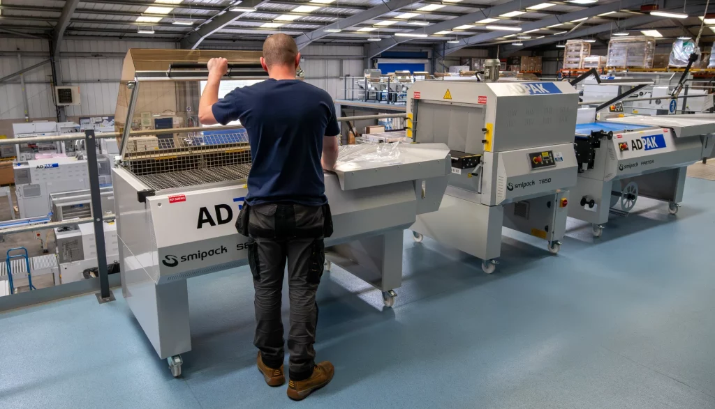 L-Sealer (on left) and Shrink Tunnel machine (on right)